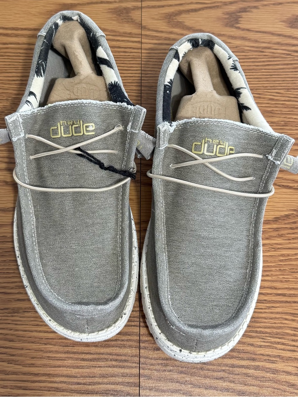 Hey Dude Wally Stretch size 11, outer gray. Inside Black Palm Trees on Beige